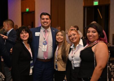 Guests raising a glass together at a corporate reception in Orlando
