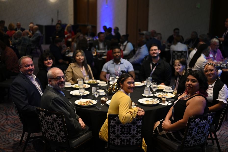 Guests at a banquet table during a gala dinner