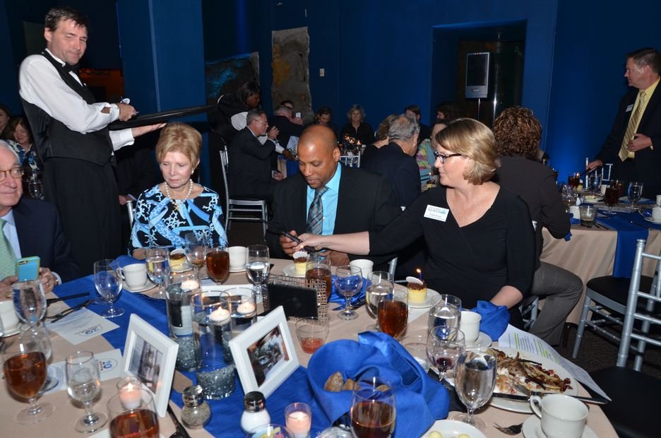 Guests seated for dinner as service begins