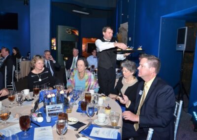 Guests seated for dinner as service begins at The Florida Aquarium, Tampa